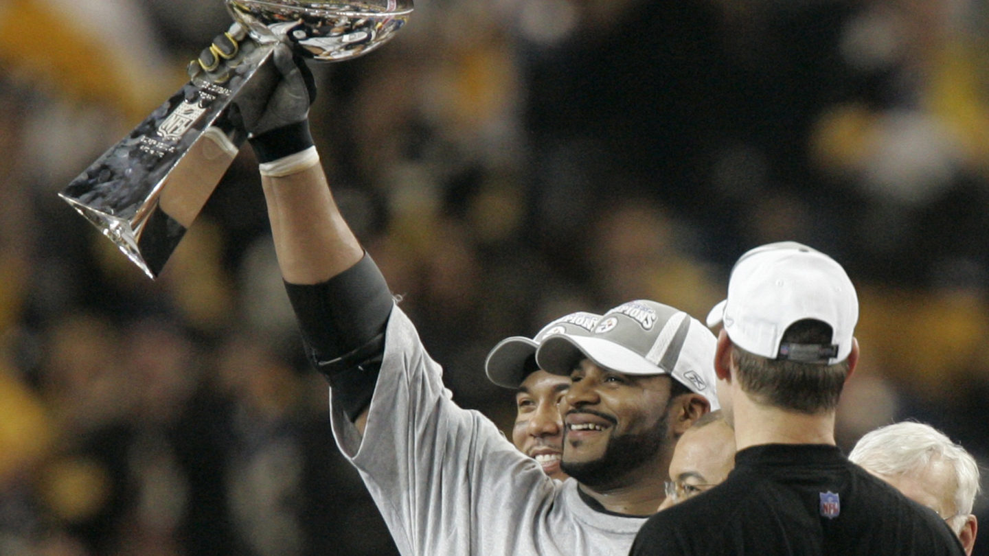 FILE - In this Feb. 5, 2006, file photo, Pittsburgh Steelers' Jerome Bettis hoists the Vince Lombardi Trophy as coach Bill Cowher, right, and MVP Hines Ward, left, watch as they celebrate the Steelers' 21-10 win over the Seattle Seahawks in the Super Bowl XL NFL football game in Detroit. (AP Photo/Charlie Neibergall, File