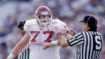 1 Jan 1999: Brandon Burlsworth #77 of the Arkansas Razorbacks talks to an official during the Florida Citrus Bowl Game against the Michigan Wolverines at the Citrus Bowl in Orlando, Florida. The Wolverines defeated the Razorbacks 45-31. Mandatory Credit: Andy Lyons /Allsport
