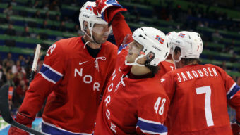 VANCOUVER, BC - FEBRUARY 20: Tore Vikingstad (L) #29 of Norway is congratulated by teammate Mats Aasen Zuccarello #48 after scoring his team's third goal during the ice hockey men's preliminary game between Norway and Switzerland on day 9 of the Vancouver 2010 Winter Olympics at Canada Hockey Place on February 20, 2010 in Vancouver, Canada. (Photo by Bruce Bennett/Getty Images)
